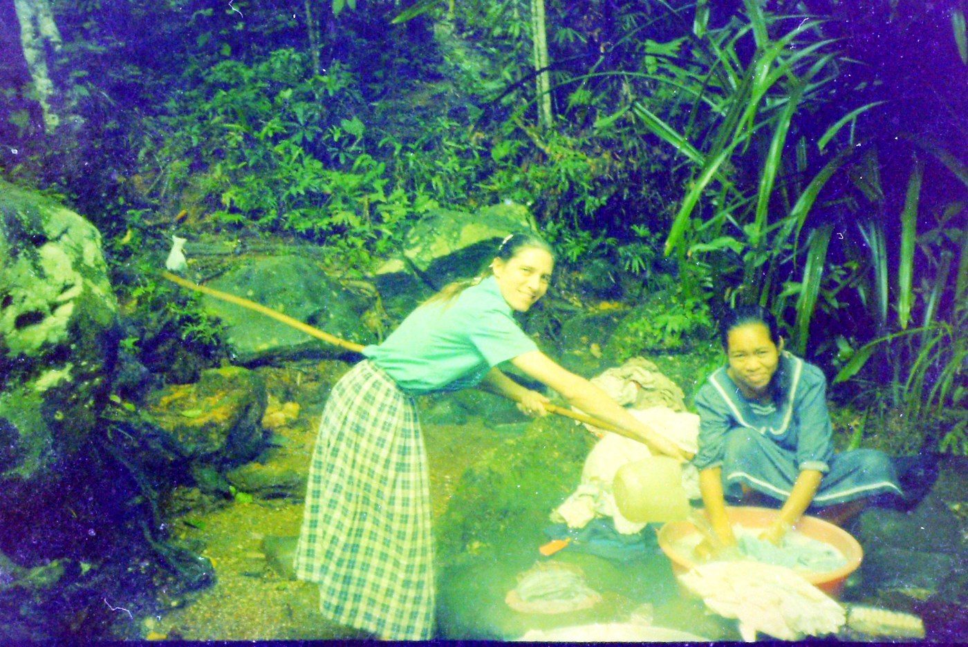 My mother washing our clothes by hand, 1994–1996.