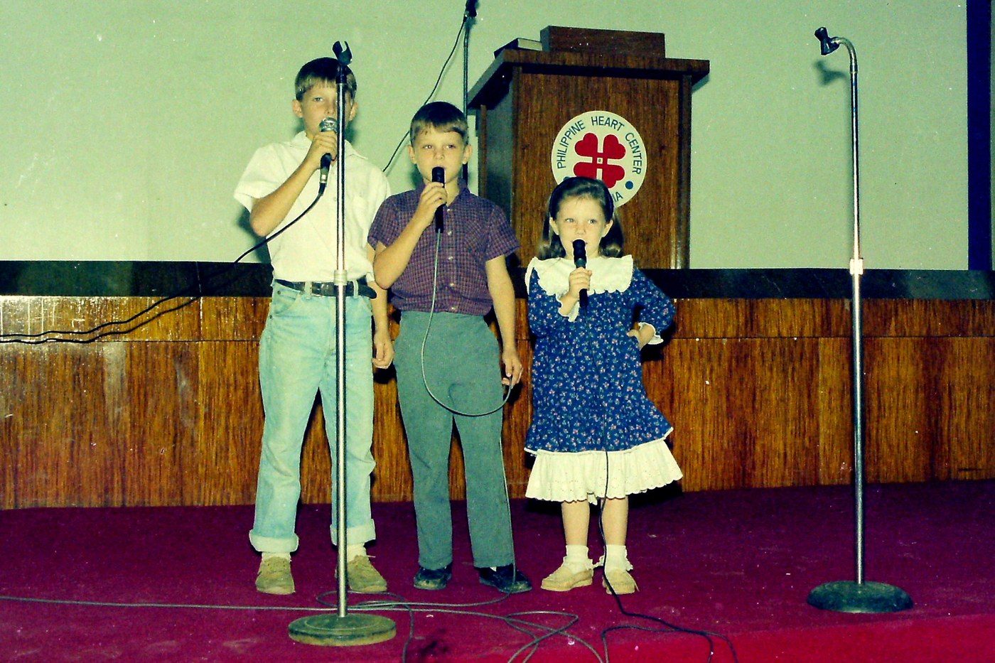 Singing in church with my brothers, 1989–1990.