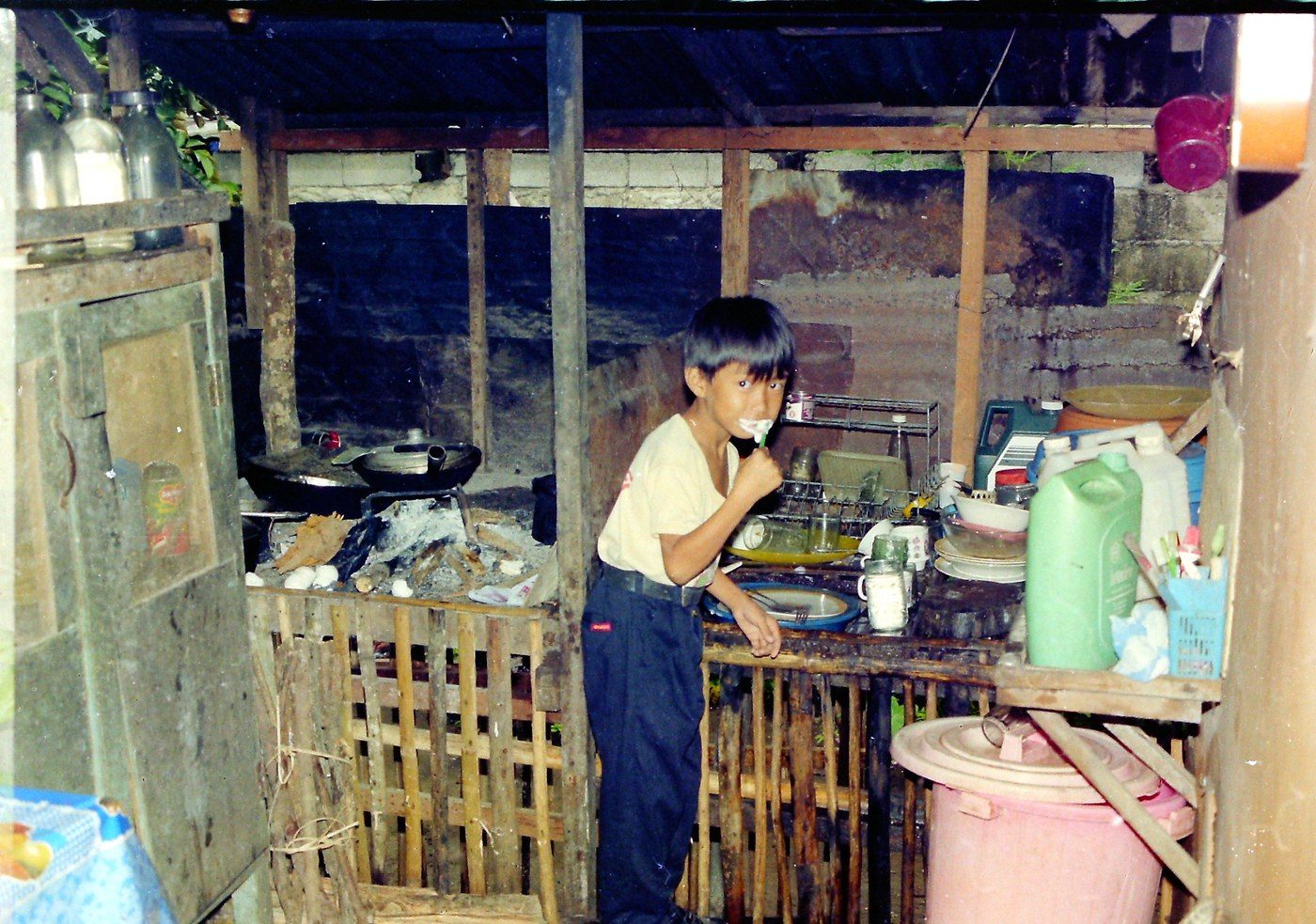 In the kitchen of one of the homes we visited on our mission travels, 1990–1993.