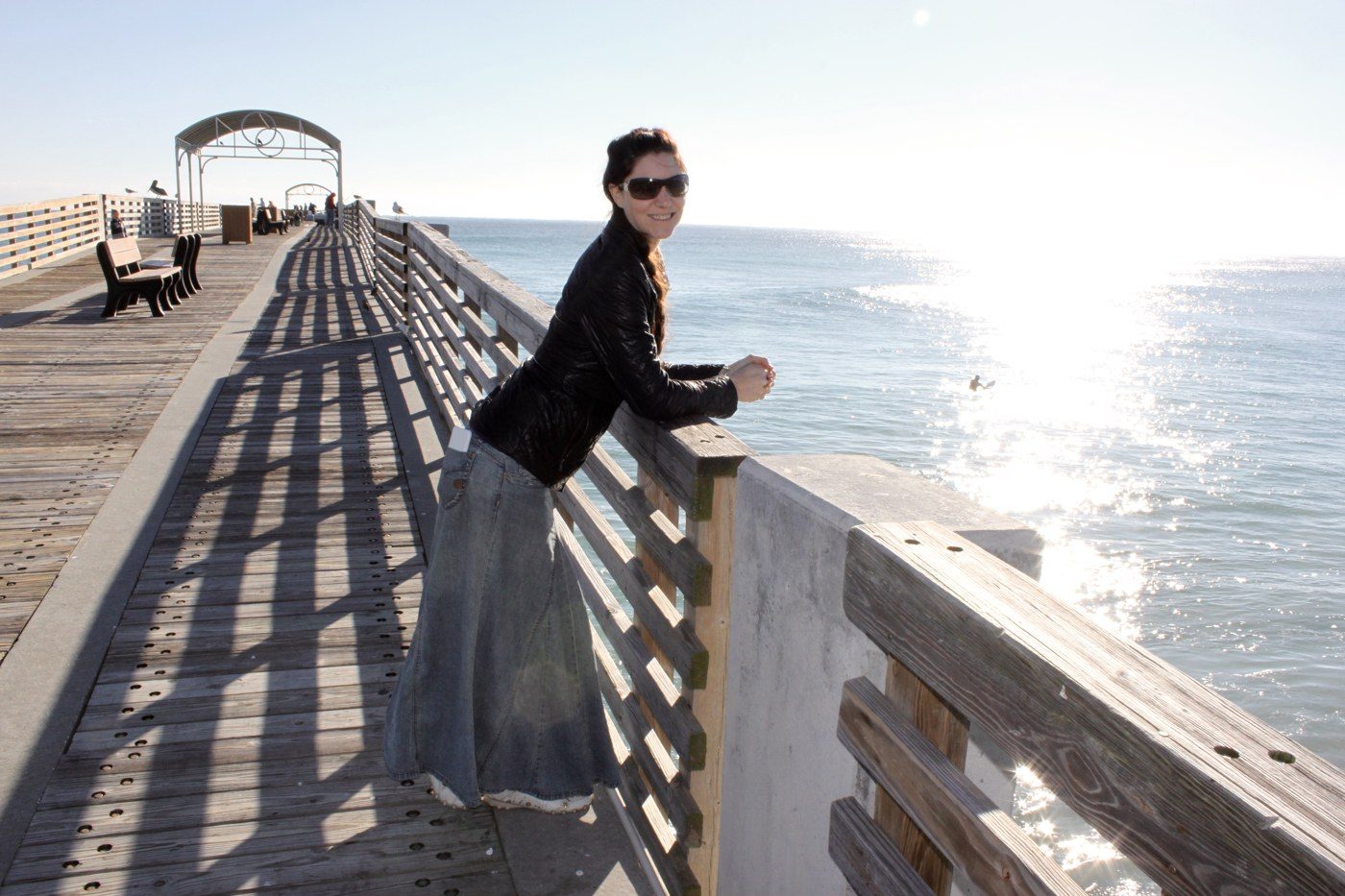 Me on a pier by the ocean, January 2016.