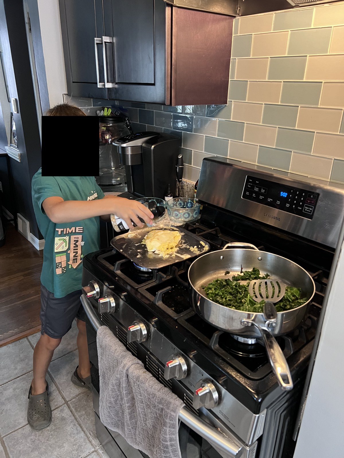 Cooking dinner, July 2023.